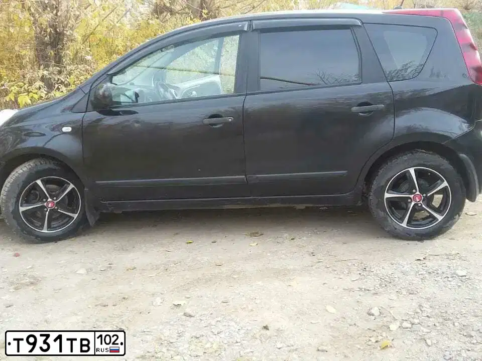 Фото автомобиля DAEWOO NEXIA, 2012 — госномер К291ВЕ164. Цвет: серебристый