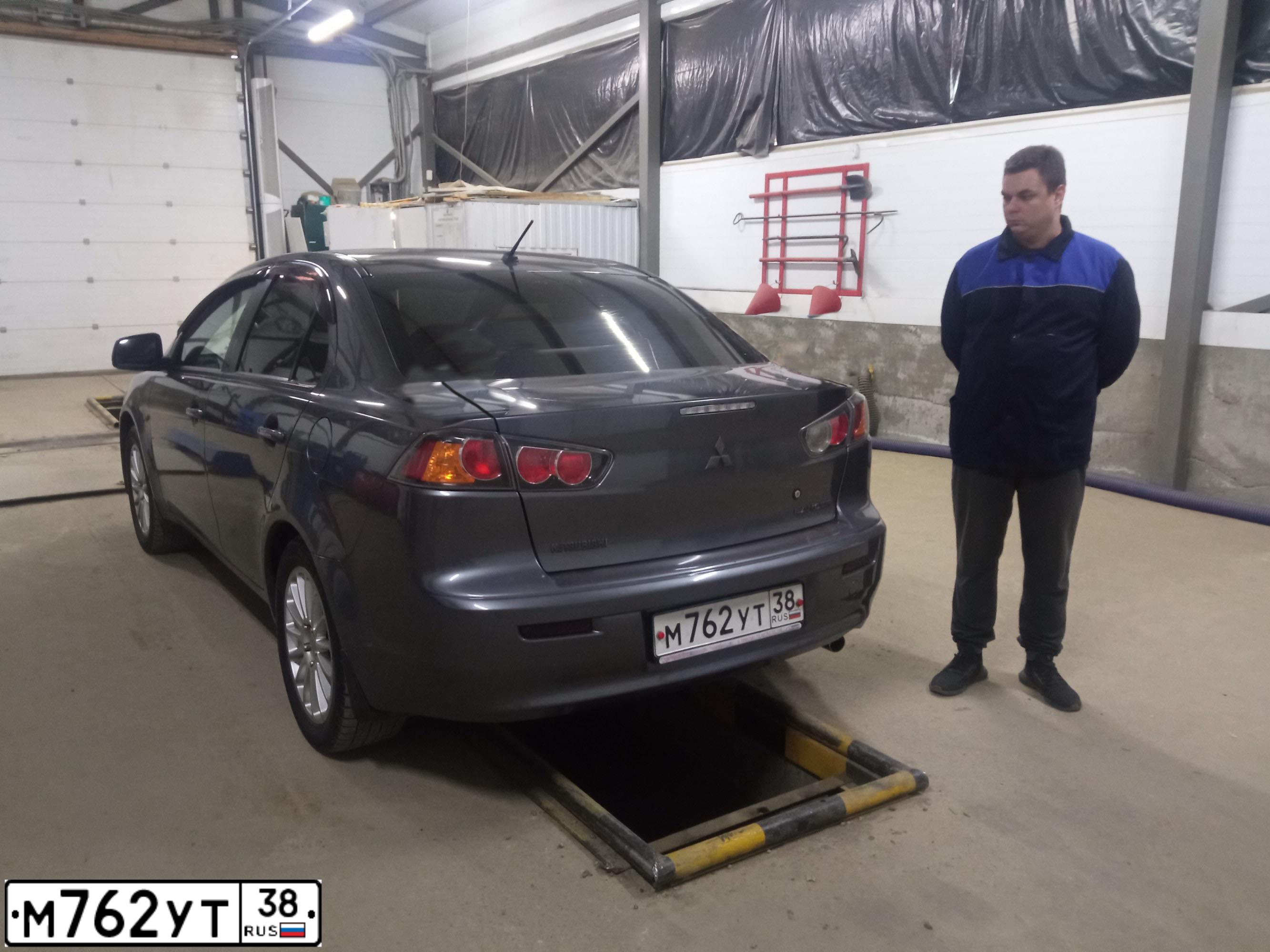 Фото автомобиля MITSUBISHI LANCER, 2011 — госномер М762УТ38. Цвет: СЕРЫЙ