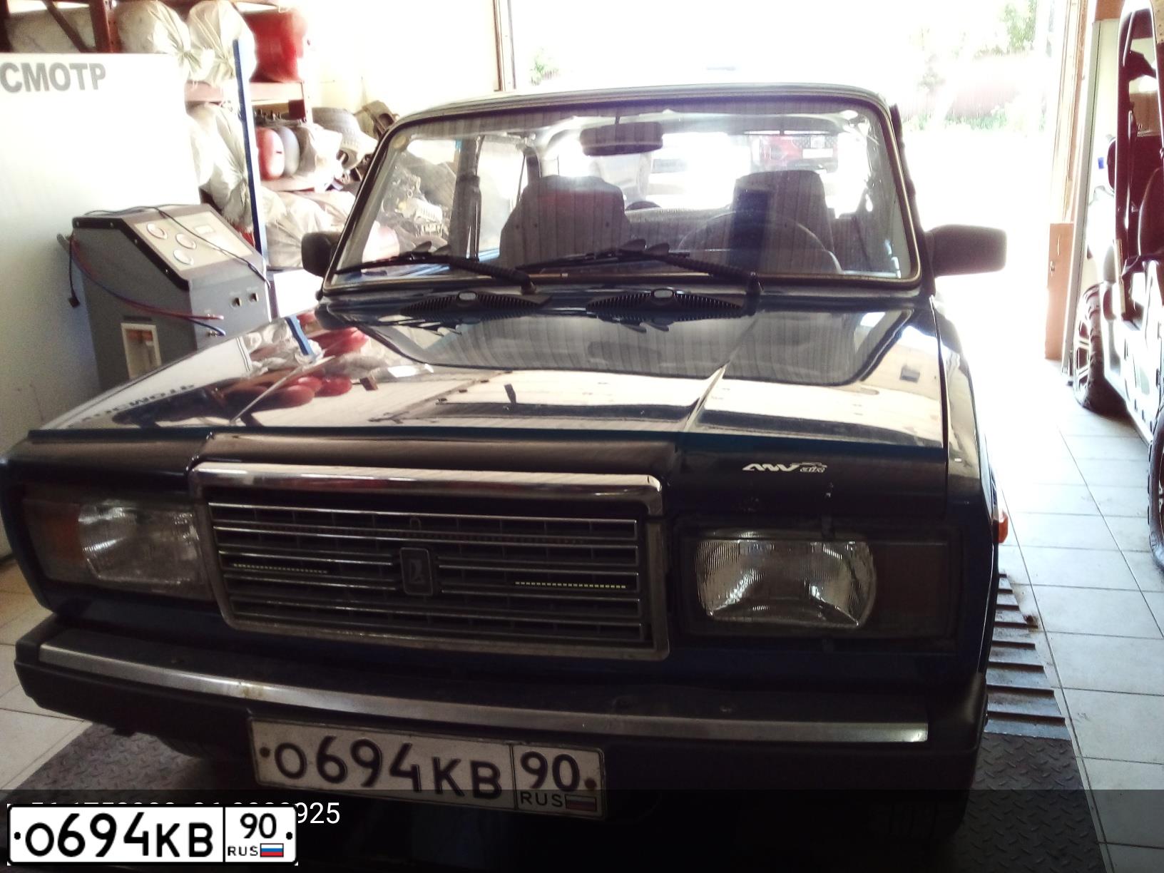 Фото автомобиля LADA 2107, 2002 — госномер О694КВ90. Цвет: ЗЕЛЕНЫЙ СИНИЙ