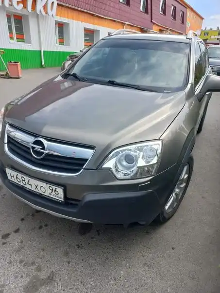 Фото автомобиля FORD FOCUS, 2011 — госномер Н585НТ174. Цвет: ТЕМНО-СЕРЫЙ
