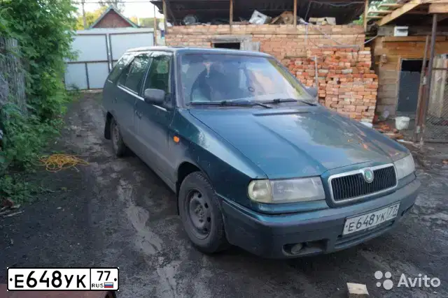 Фото автомобиля SKODA FELICIA, 1998 — госномер Е648УК77. Цвет: ЗЕЛЕНЫЙ