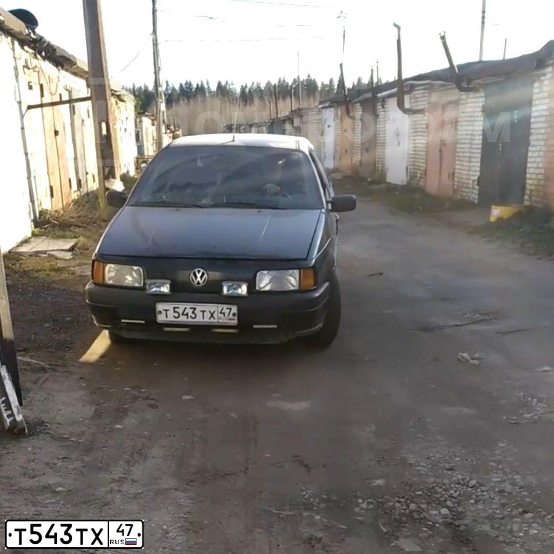 Фото автомобиля VOLKSWAGEN PASSAT, 1991 — госномер Т543ТХ47. Цвет: ТЕМНО-СИНИЙ