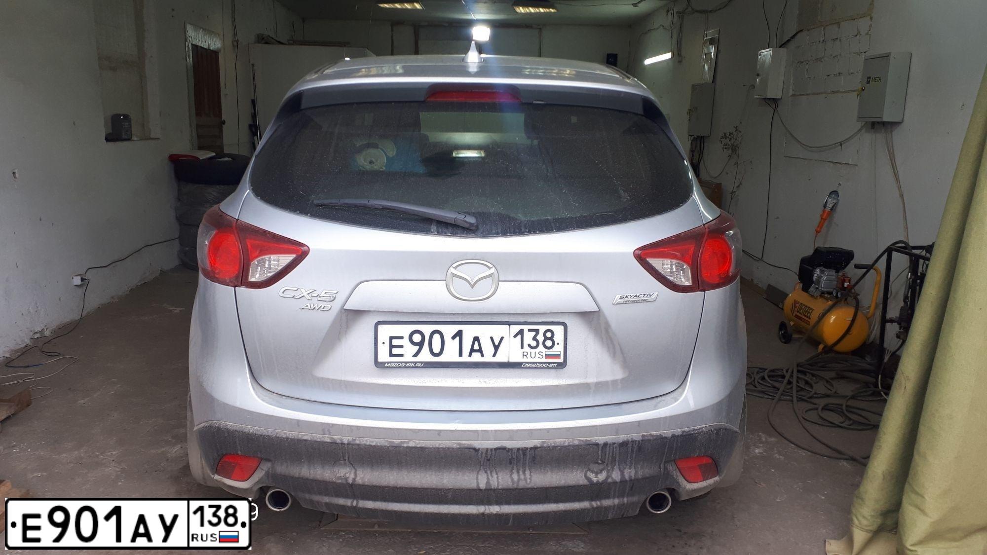 Фото автомобиля MAZDA CX-5, 2015 — госномер Е100КВ138. Цвет: СЕРЫЙ