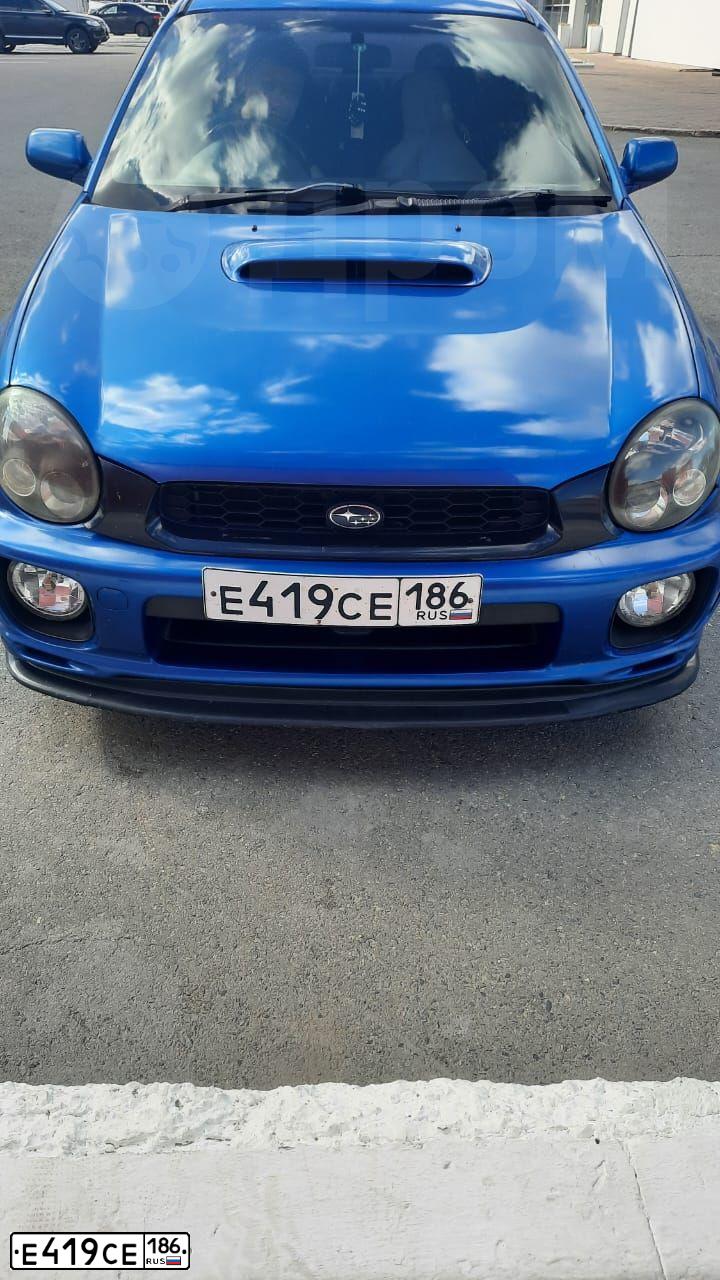 Фото автомобиля SUBARU IMPREZA, 2002 — госномер К768НО761. Цвет: синий
