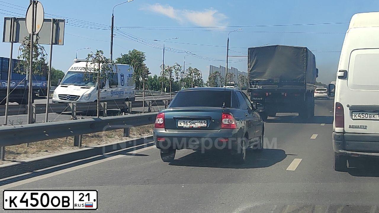 Фото автомобиля KIA CERATO, 2009 — госномер К450ОВ21. Цвет: ЧЕРНЫЙ