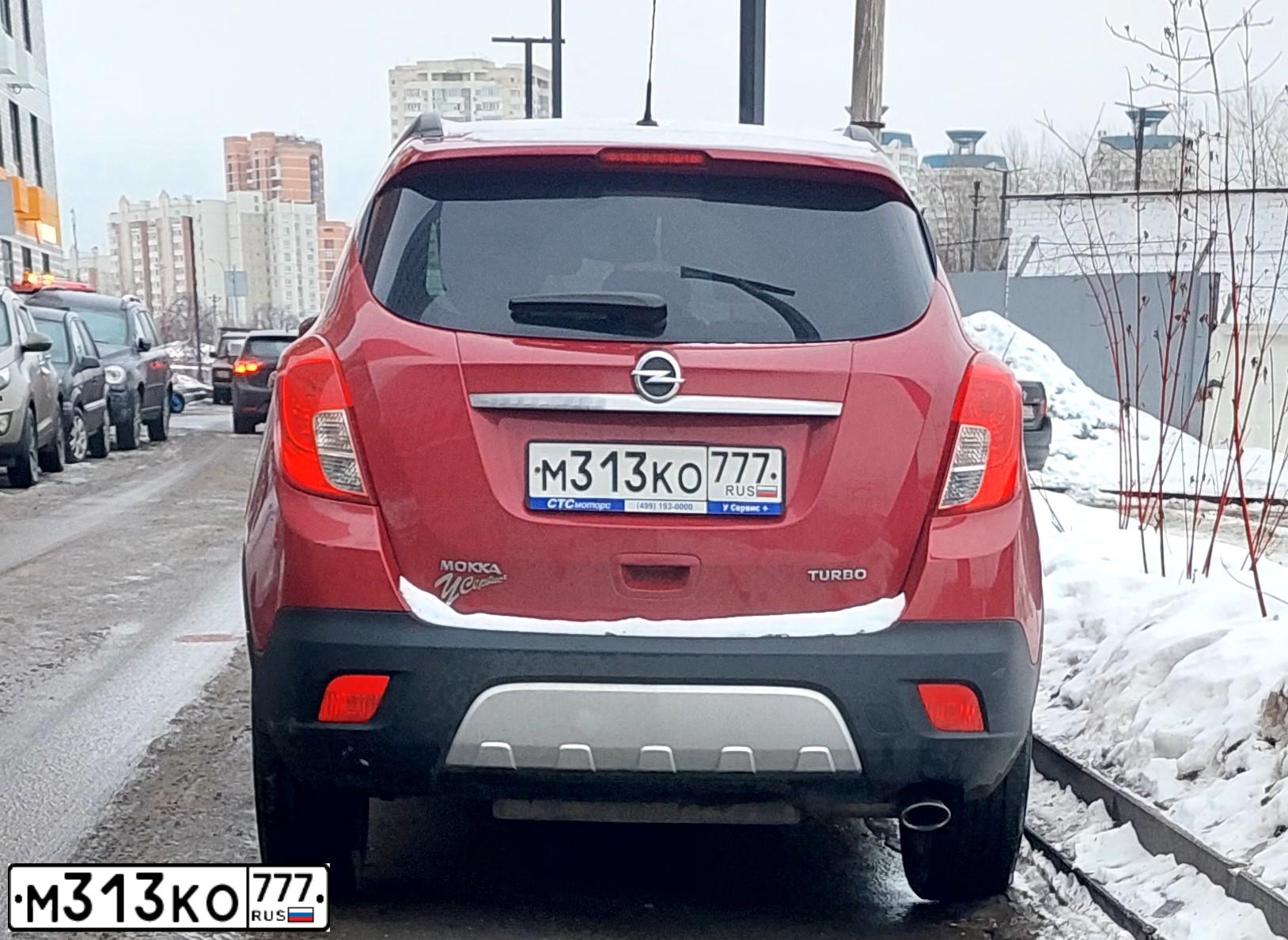 Фото автомобиля OPEL MOKKA, 2014 — госномер М313КО777. Цвет: КРАСНЫЙ