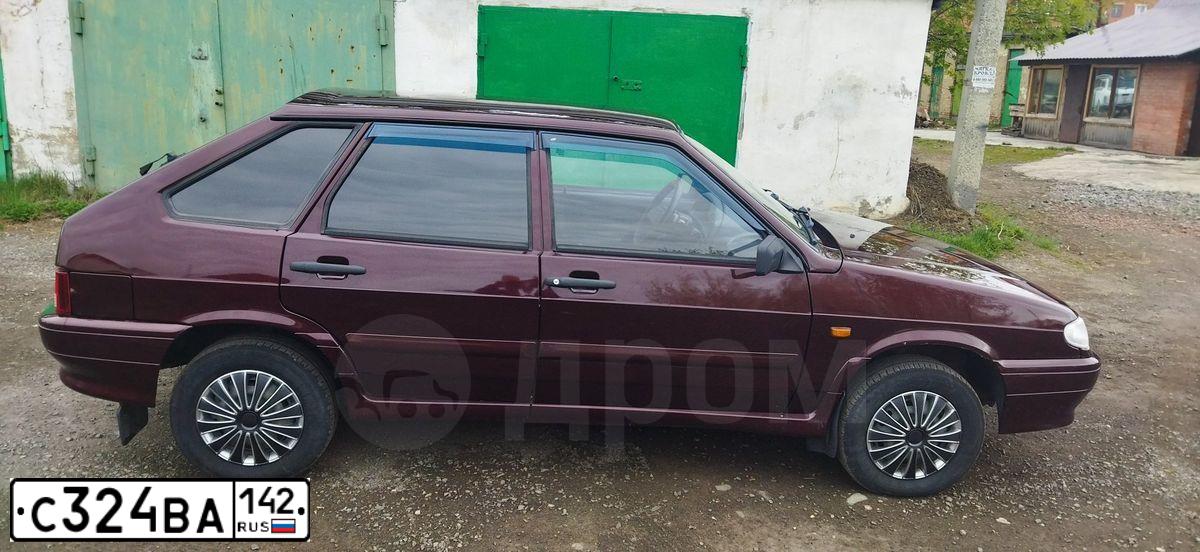 Фото автомобиля LADA 2114 SAMARA, 2012 — госномер Р852МХ142. Цвет: ТЕМНО-ВИШНЕВЫЙ