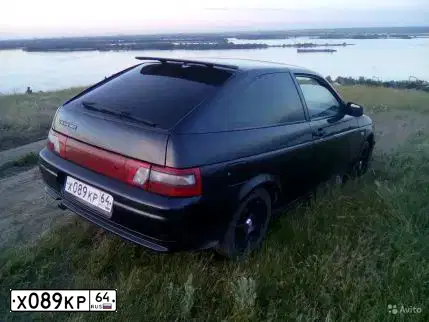 Фото автомобиля LADA 2112, 2008 — госномер М911ЕК164. Цвет: ГРАФИТОВЫЙ МЕТАЛЛИК
