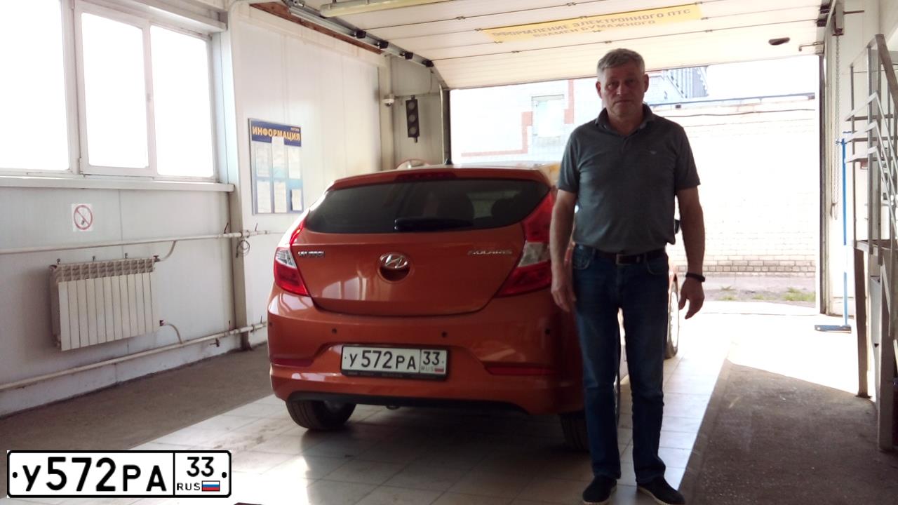 Фото автомобиля HYUNDAI SOLARIS, 2015 — госномер Х307ОТ37. Цвет: Оранжевый