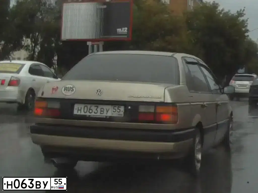 Фото автомобиля VOLKSWAGEN PASSAT, 1989 — госномер Н063ВУ55. Цвет: ЗОЛОТИСТЫЙ