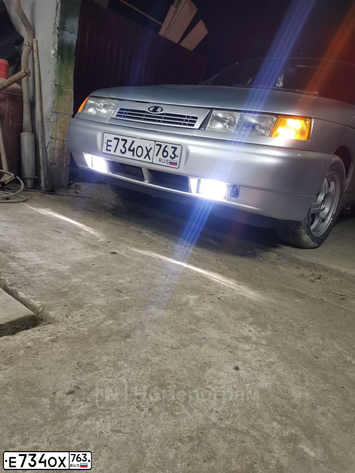 Фото автомобиля LADA 2112, 2004 — госномер Е734ОХ763. Цвет: Серебристо-Желтый
