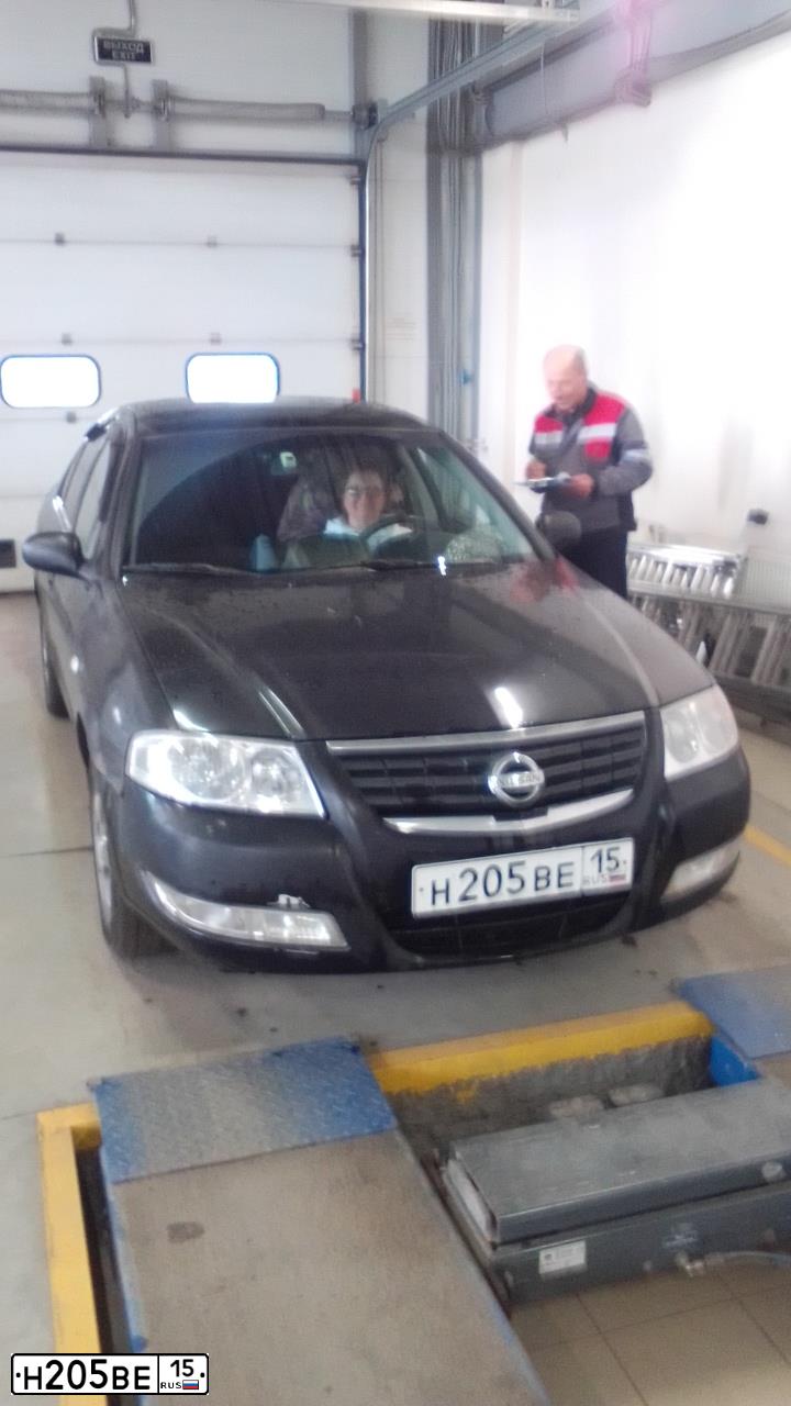 Фото автомобиля NISSAN ALMERA, 2006 — госномер Н205ВЕ15. Цвет: ЧЕРНЫЙ