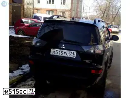 Фото автомобиля MITSUBISHI OUTLANDER, 2011 — госномер Т612ОК71. Цвет: ЧЕРНЫЙ