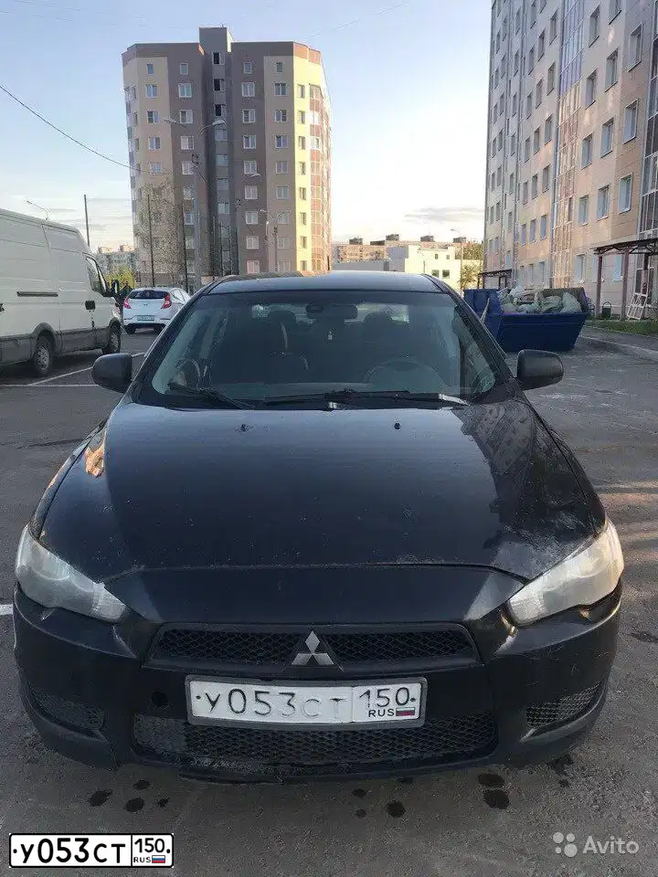 Фото автомобиля MITSUBISHI LANCER, 2008 — госномер О581ЕА181. Цвет: ЧЕРНЫЙ
