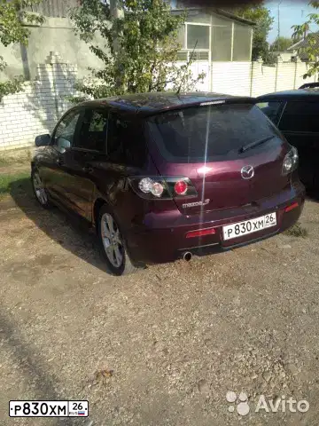 Фото автомобиля MAZDA A 3, 2007 — госномер Р830ХМ26. Цвет: ТЕМНО ВИШНЕВЫЙ