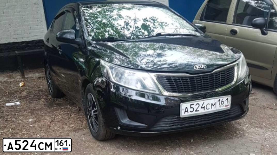 Фото автомобиля KIA RIO, 2013 — госномер А524СМ161. Цвет: ЧЕРНЫЙ