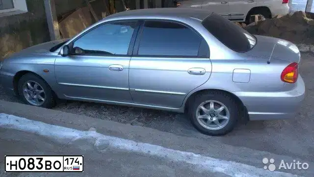 Фото автомобиля KIA SPECTRA, 2007 — госномер Н083ВО174. Цвет: АЛМАЗНОЕ СЕРЕБРО