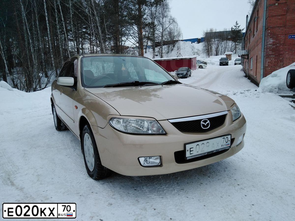 Фото автомобиля TOYOTA COROLLA, 2008 — госномер Е331МХ70. Цвет: СЕРЕБРИСТЫЙ