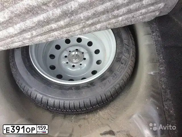 Фото автомобиля LADA 2190 GRANTA, 2013 — госномер Е391ОР159. Цвет: Сине-Черный