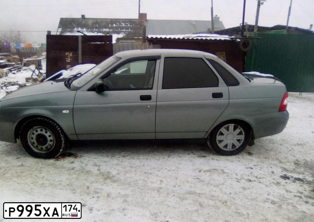 Фото автомобиля LADA 2170 PRIORA, 2008 — госномер Р995ХА174. Цвет: СРЕДНИЙ СЕРО-ЗЕЛЕНЫЙ МЕТ.