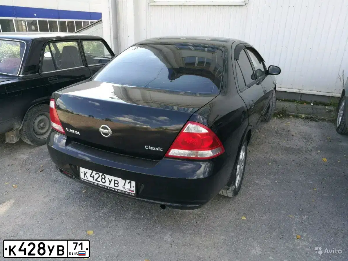 Фото автомобиля NISSAN ALMERA, 2010 — госномер Т431ЕВ71. Цвет: ЧЕРНЫЙ