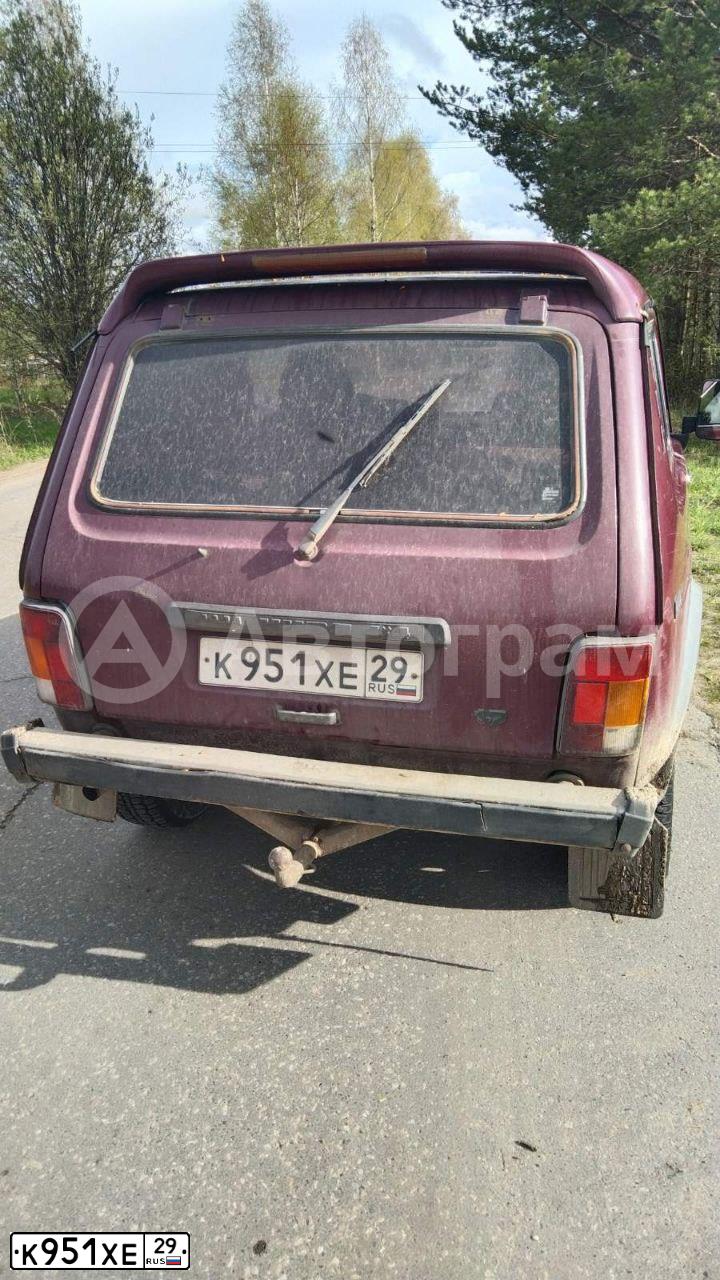 Фото автомобиля LADA 2121 NIVA, 1999 — госномер К951ХЕ29. Цвет: ТЕМНО-БОРДОВЫЙ