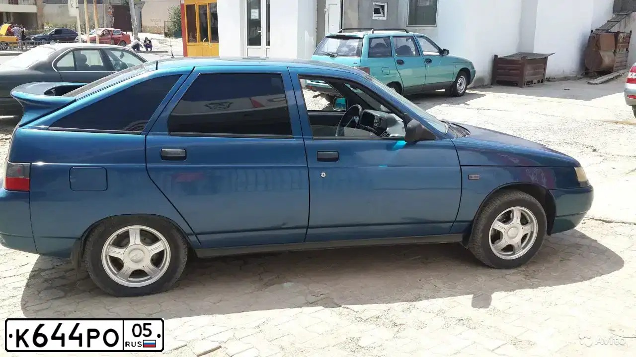 Фото автомобиля ВАЗ21099, 2002 — госномер А275ВУ26. Цвет: ТЕМНО-ЗЕЛЕНЫЙ