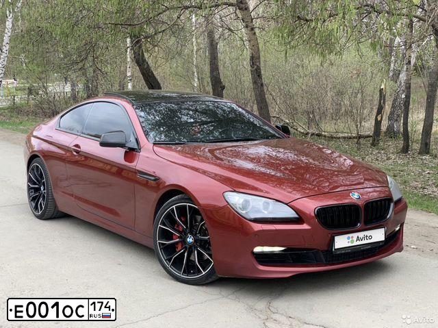 Фото автомобиля LADA 2107, 2009 — госномер Е001ОС174. Цвет: Белый