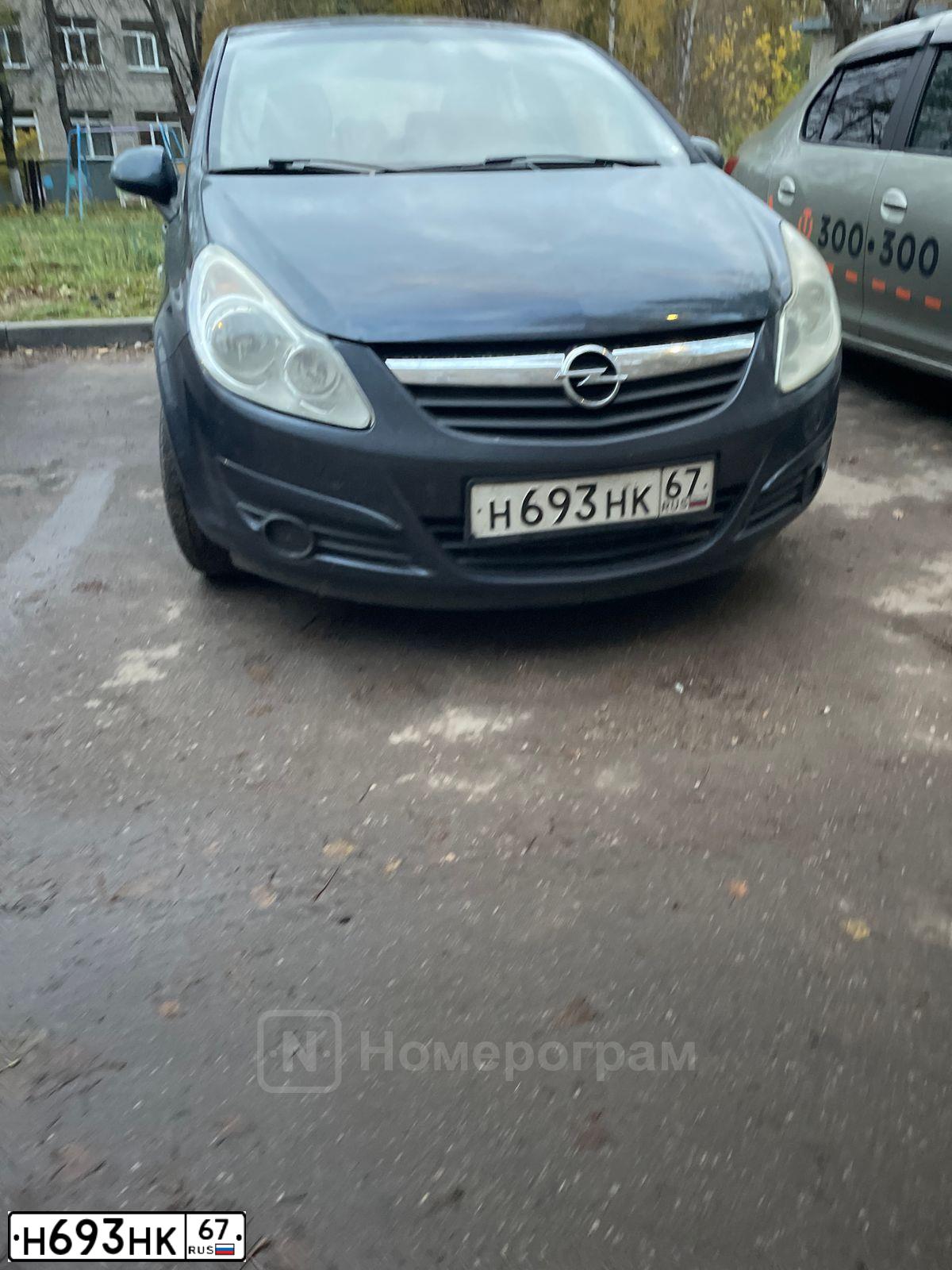 Фото автомобиля OPEL CORSA, 2009 — госномер Н693НК67. Цвет: СЕРЫЙ