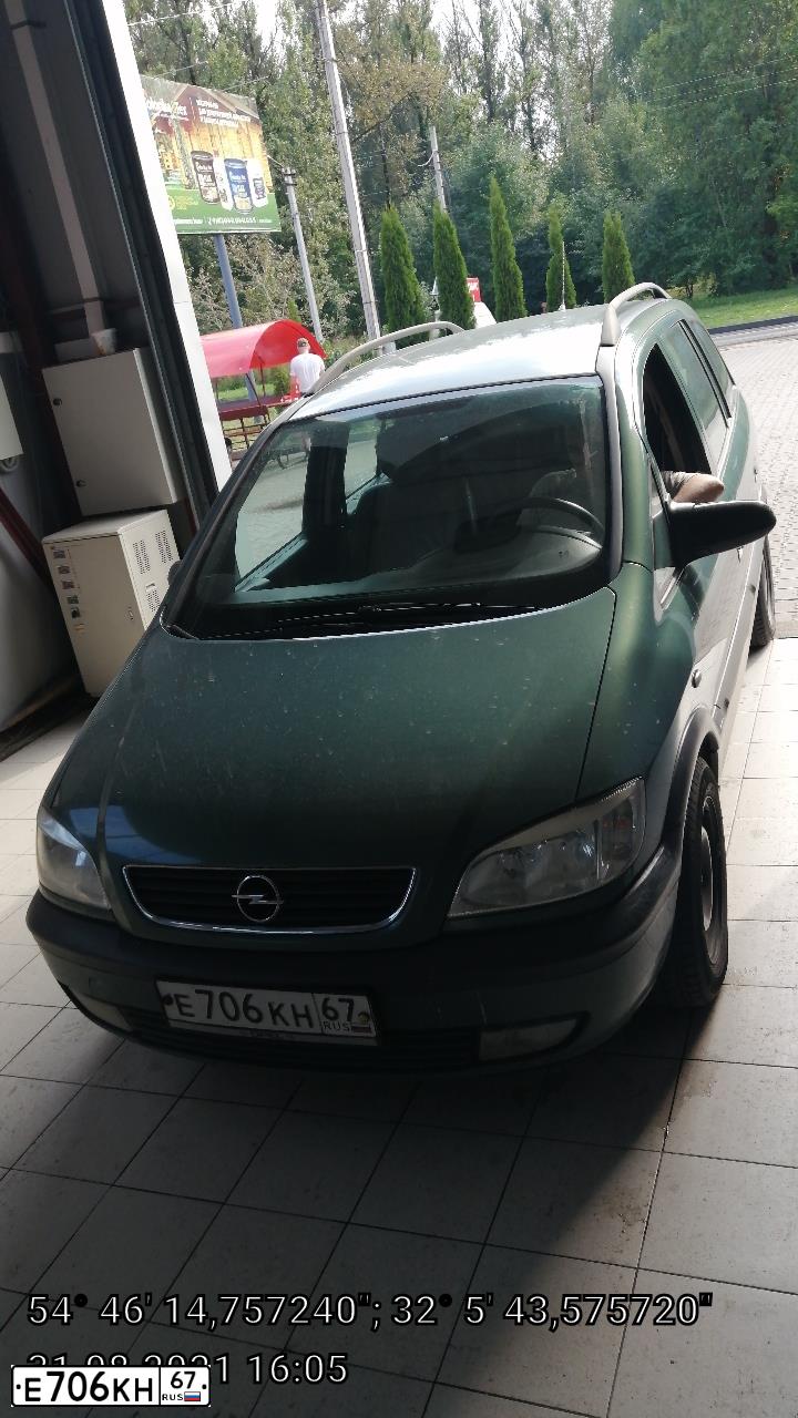 Фото автомобиля OPEL ZAFIRA, 2002 — госномер Е706КН67. Цвет: ЗЕЛЕНЫЙ