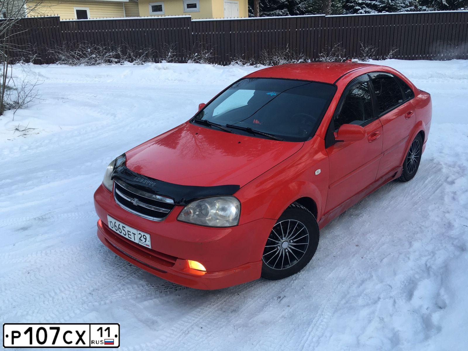 Фото автомобиля CHEVROLET LACETTI, 2007 — госномер О665ЕТ29. Цвет: Красный