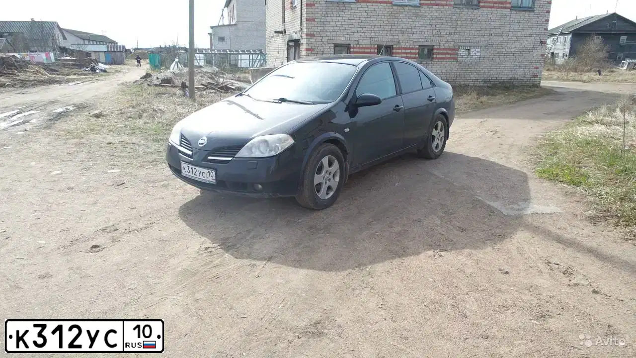 Фото автомобиля NISSAN PRIMERA, 2002 — госномер К312УС10. Цвет: ЧЕРНЫЙ