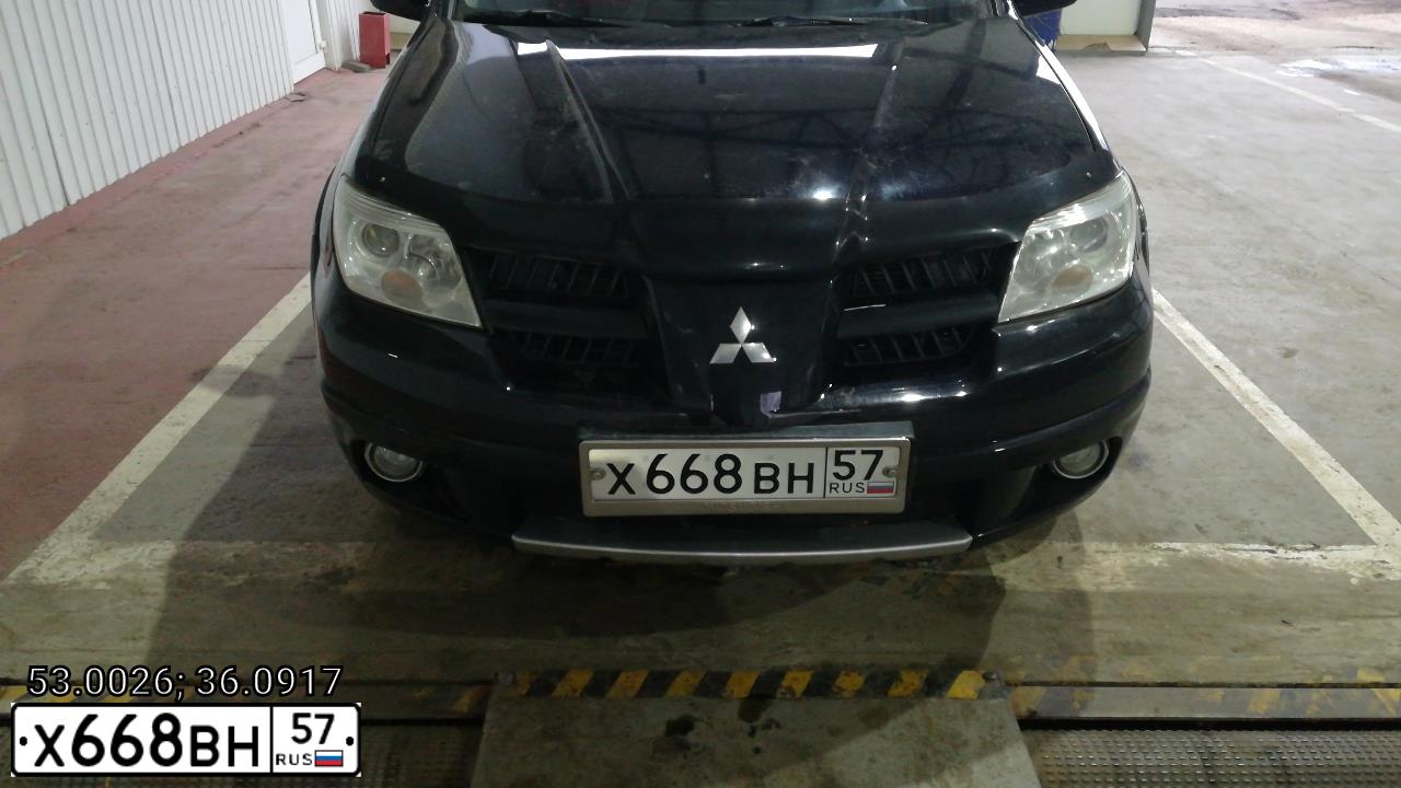Фото автомобиля MITSUBISHI OUTLANDER, 2014 — госномер Х668ВН57. Цвет: БЕЛЫЙ