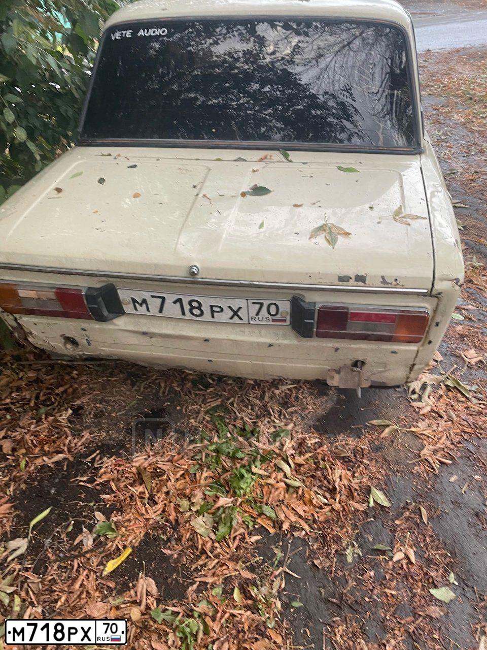 Фото автомобиля LADA 2106, 1990 — госномер М718РХ70. Цвет: СВЕТЛО-БЕЖЕВЫЙ