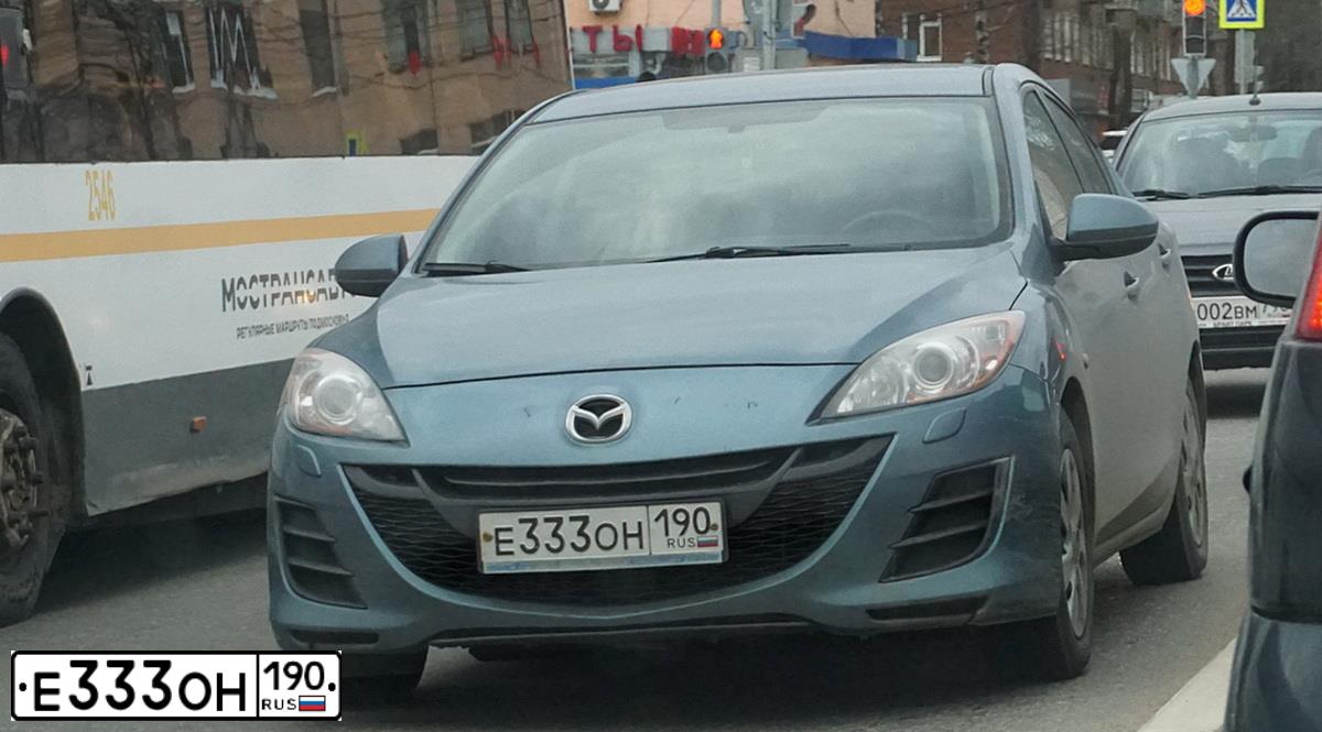 Фото автомобиля MAZDA 3, 2011 — госномер Е333ОН190. Цвет: СЕРЫЙ