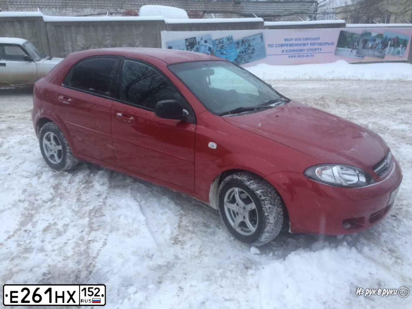 Фото автомобиля CHEVROLET LACETTI, 2011 — госномер Р191ВА152. Цвет: Красный