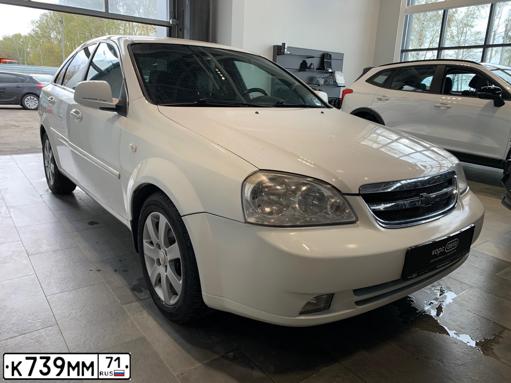 Фото автомобиля CHEVROLET LACETTI, 2012 — госномер К739ММ71. Цвет: Белый