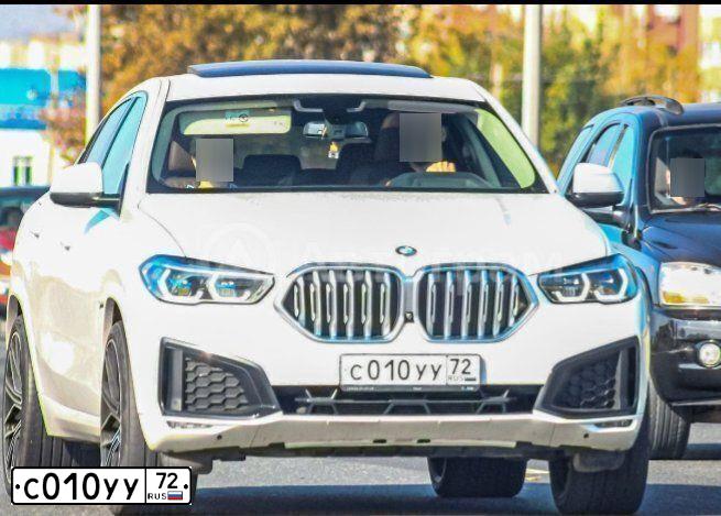 Фото автомобиля BMW X6, 2020 — госномер С010УУ72. Цвет: БЕЛЫЙ МЕТАЛЛИК