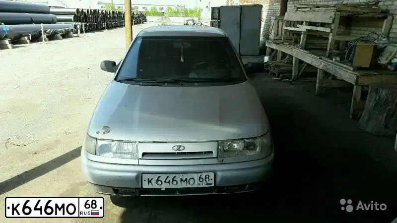 Фото автомобиля LADA 2112, 2006 — госномер Х401КЕ136. Цвет: Светло-Серебристый металлик