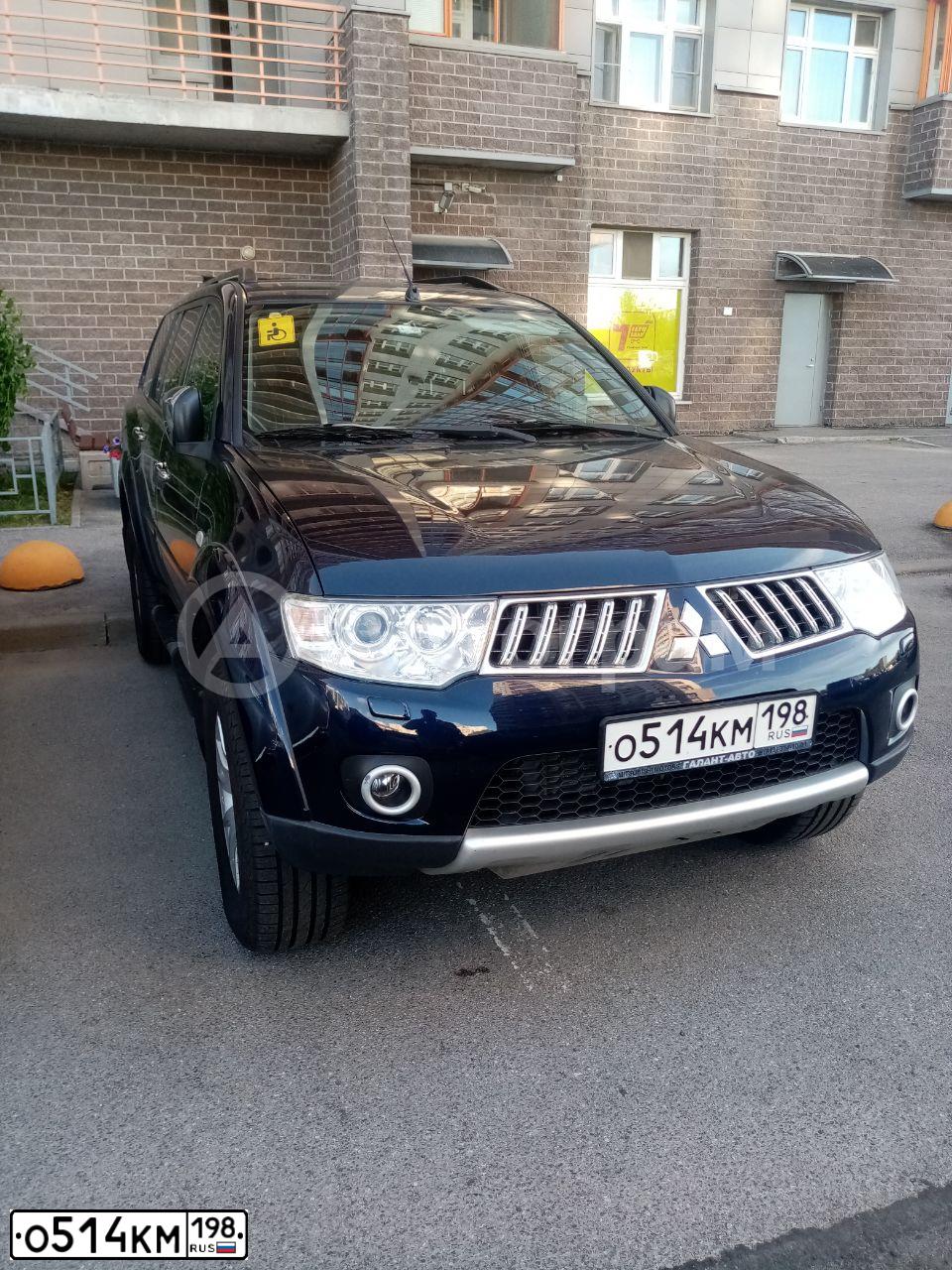 Фото автомобиля MITSUBISHI PAJERO SPORT 2.5, 2012 — госномер Е085АА147. Цвет: СИНИЙ