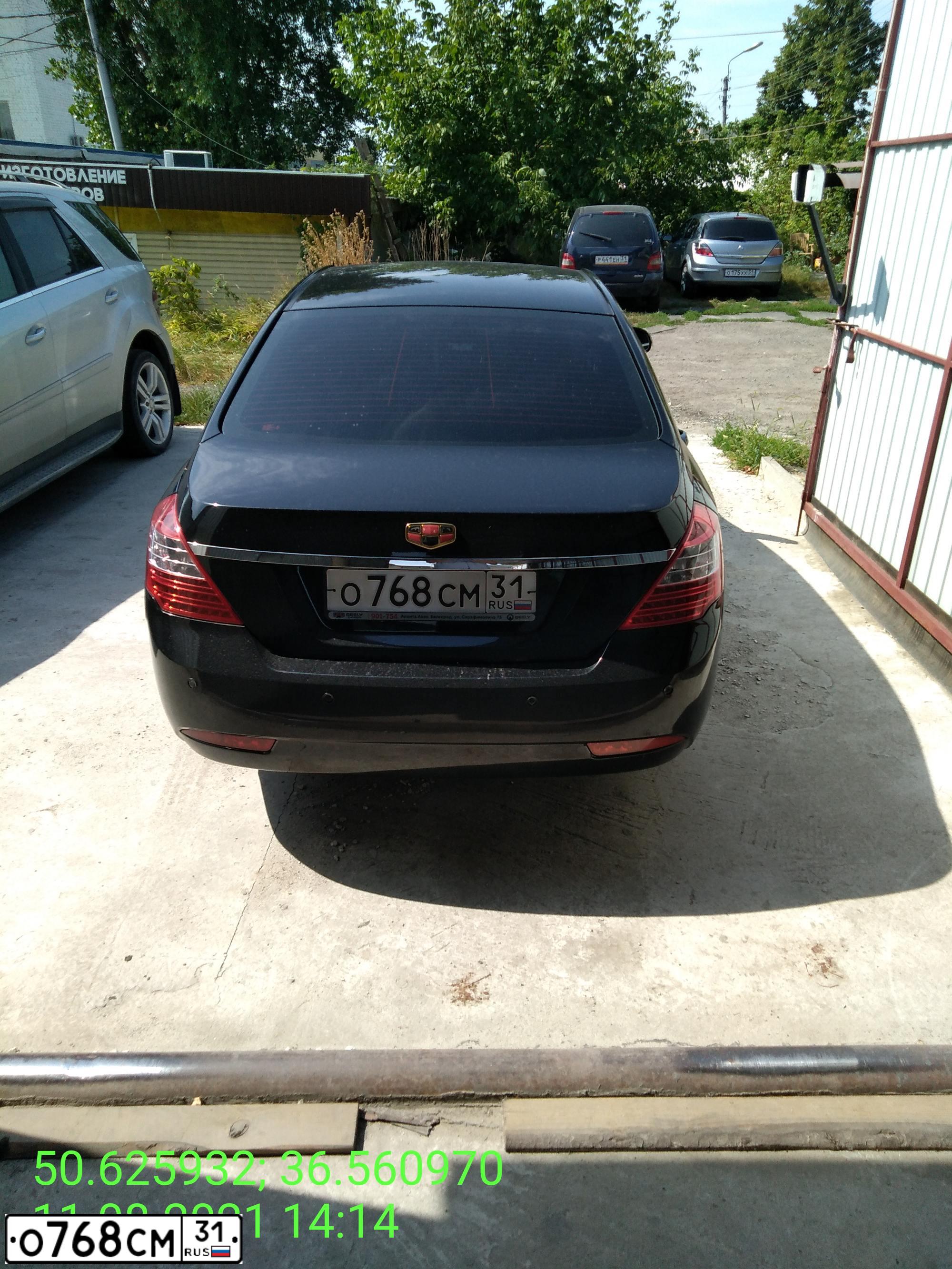 Фото автомобиля GEELY EMGRAND, 2014 — госномер О768СМ31. Цвет: ЧЕРНЫЙ