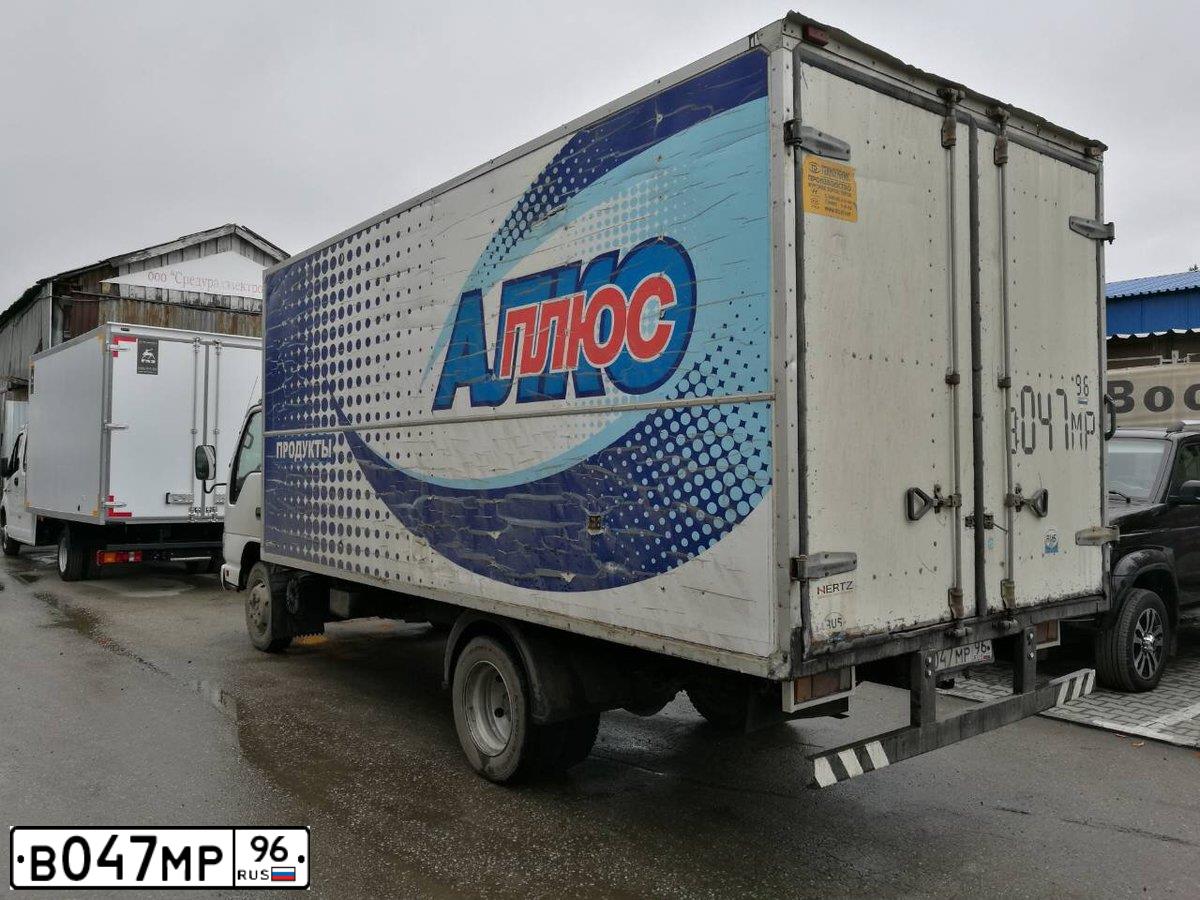 Фото автомобиля ISUZU NQR, 2006 — госномер К754РЕ154. Цвет: Белый