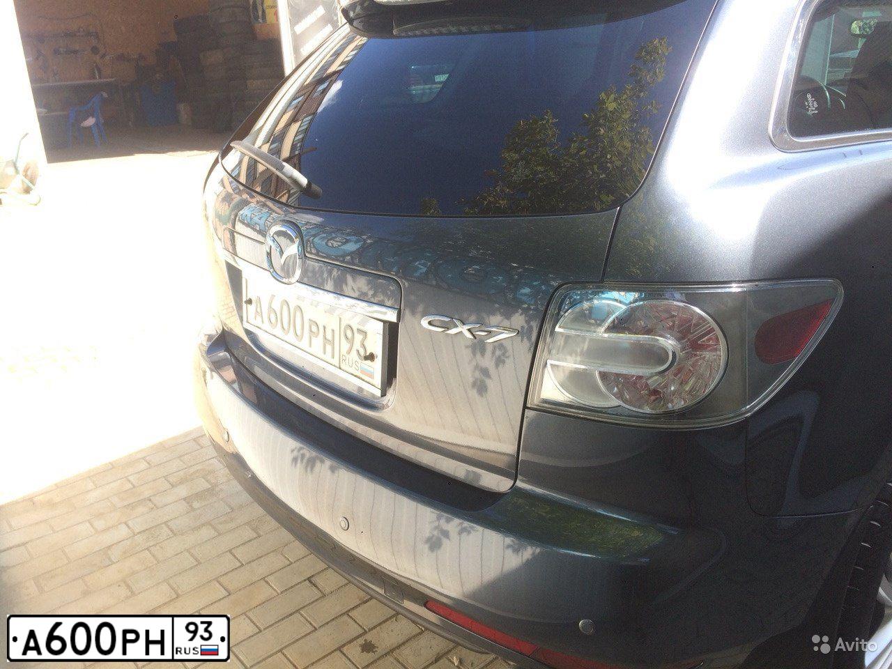 Фото автомобиля MAZDA CX-7, 2010 — госномер Е498КО126. Цвет: СЕРЫЙ