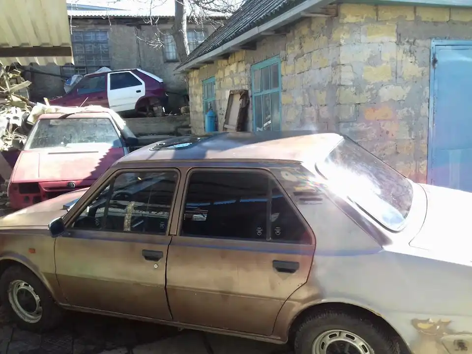 Фото автомобиля LADA 2104, 2004 — госномер О772РЕ26. Цвет: ТЕМНО-ЗЕЛЕНЫЙ