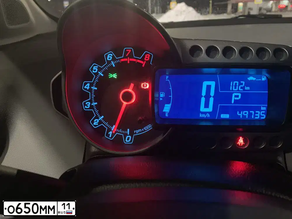Фото автомобиля CHEVROLET AVEO, 2014 — госномер О650ММ11. Цвет: КРАСНЫЙ МЕТАЛЛИК