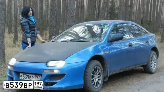Фото автомобиля MAZDA 323, 1998 — госномер В539ВР197. Цвет: синий