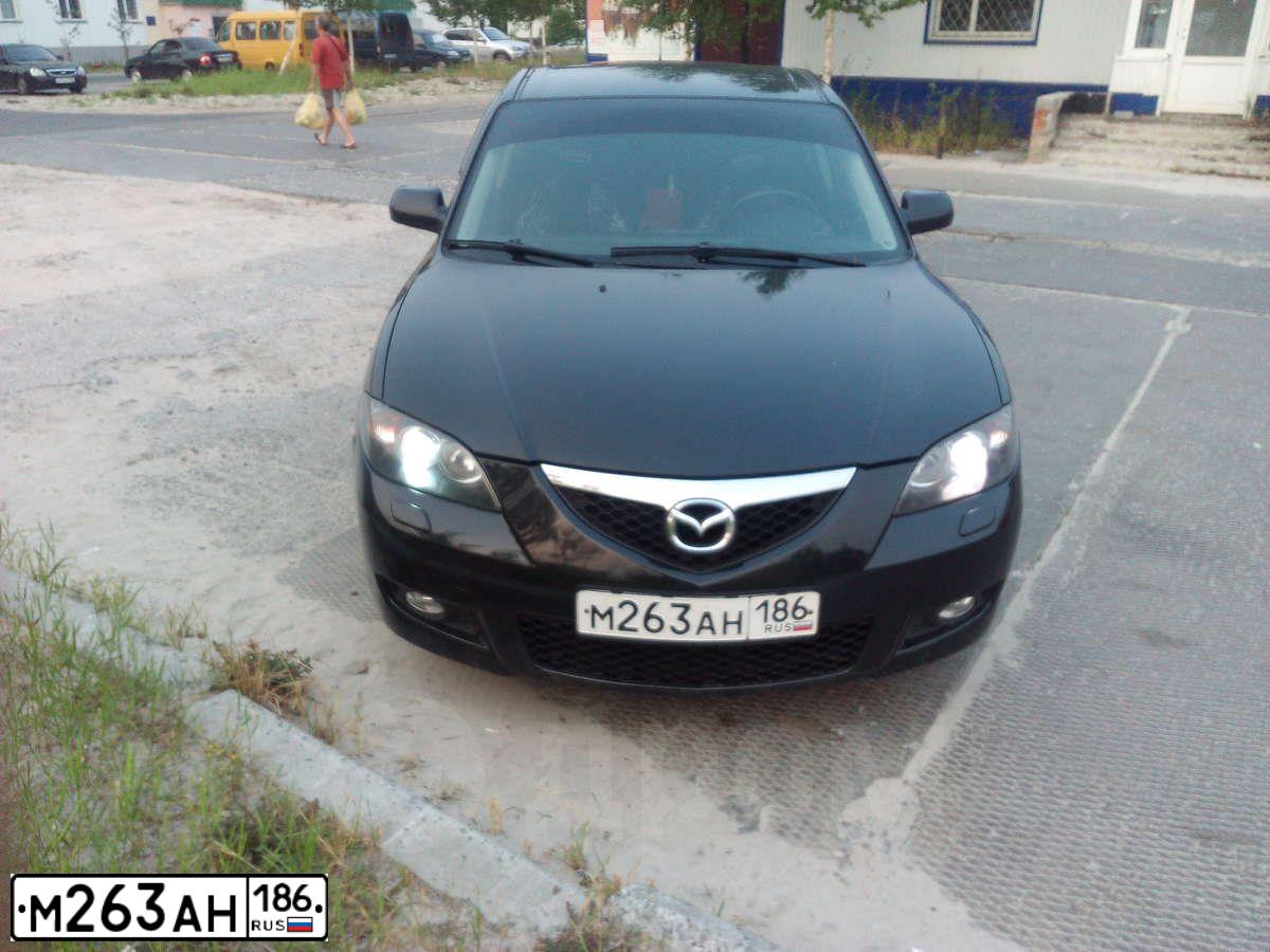 Фото автомобиля MAZDA 3, 2007 — госномер Е262КЕ186. Цвет: ЧЕРНЫЙ