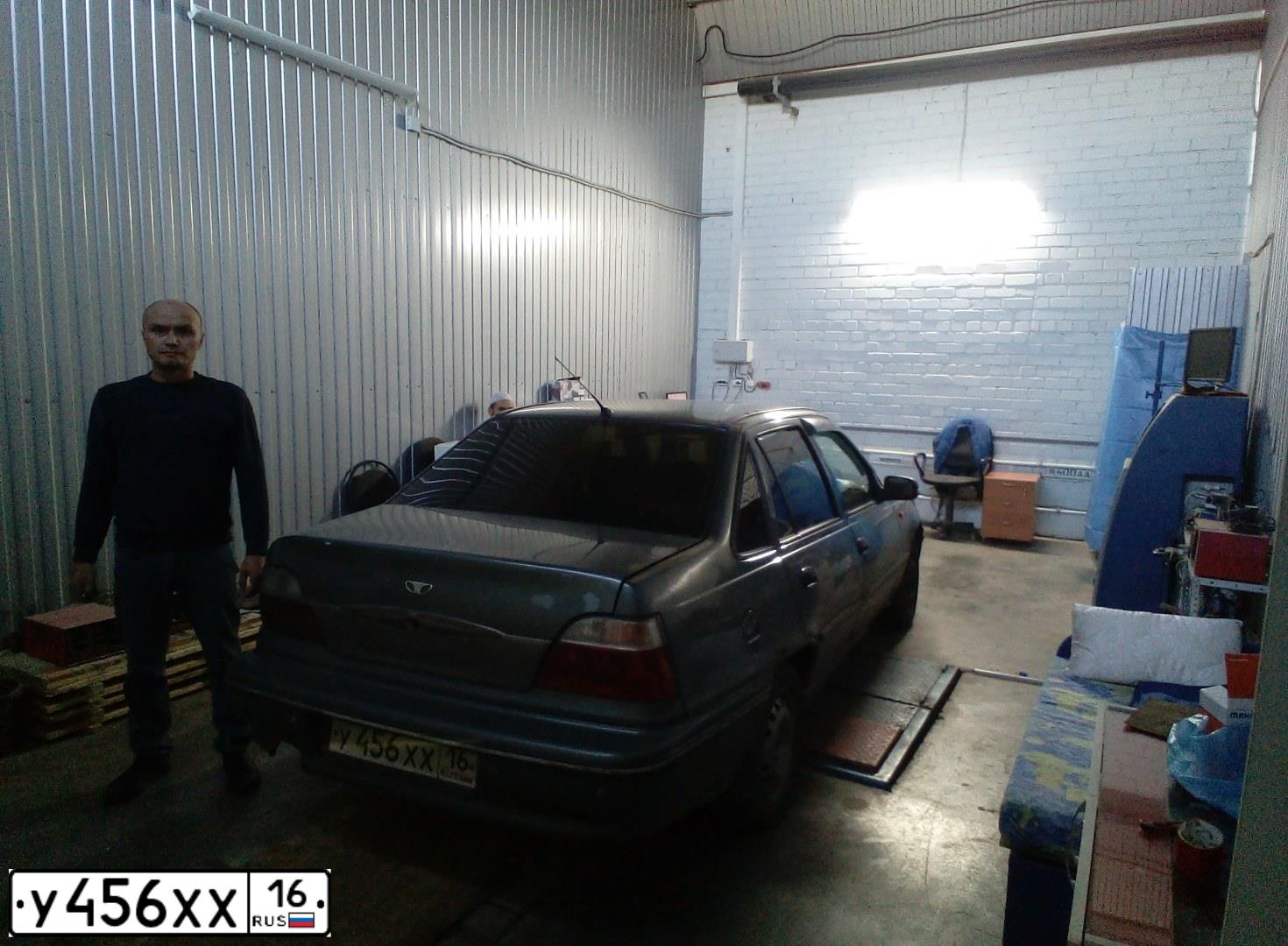 Фото автомобиля DAEWOO NEXIA, 2005 — госномер Е817НК761. Цвет: СЕРО-ЗЕЛЕНЫЙ