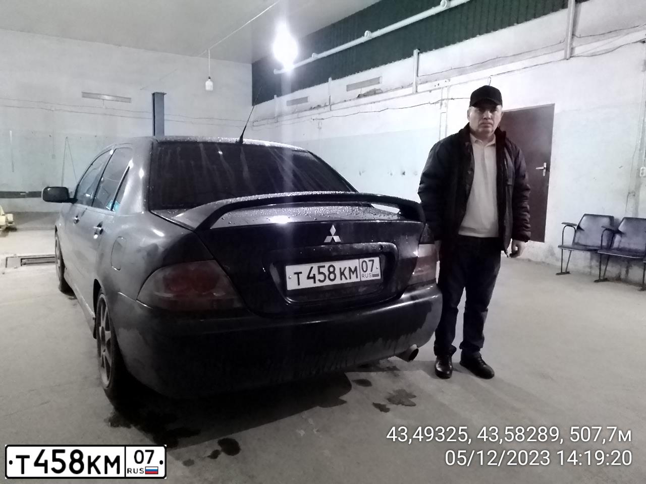 Фото автомобиля MITSUBISHI LANCER, 2007 — госномер К381ОР799. Цвет: ЧЕРНЫЙ