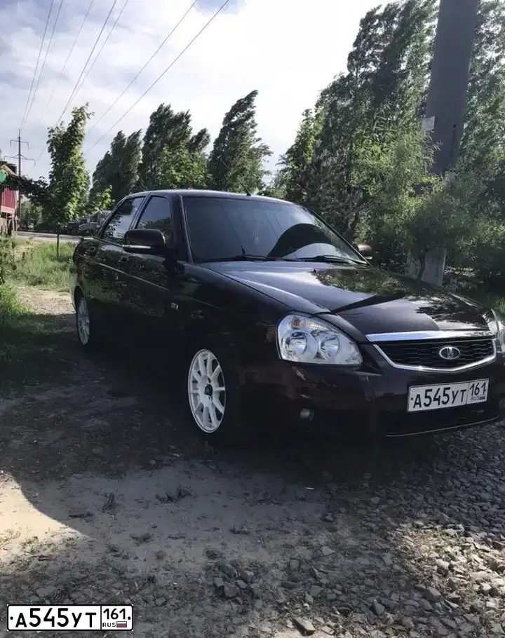 Фото автомобиля LADA 2170 PRIORA, 2012 — госномер С935ЕК761. Цвет: ТЕМНО-ВИШНЕВЫЙ